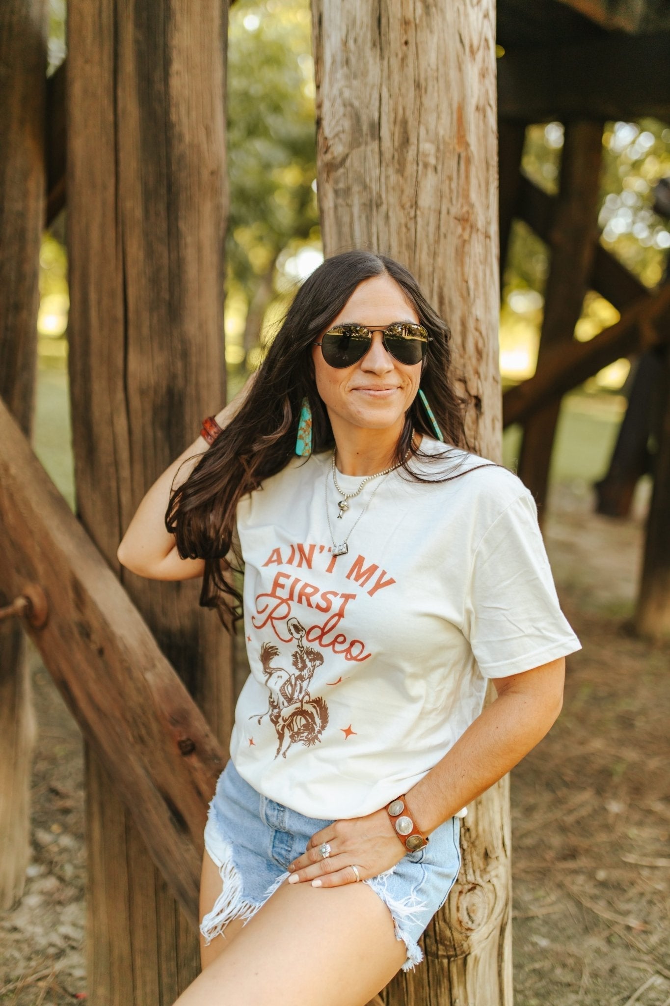 Ain't My First Rodeo Cowgirl Graphic Tee Shirt