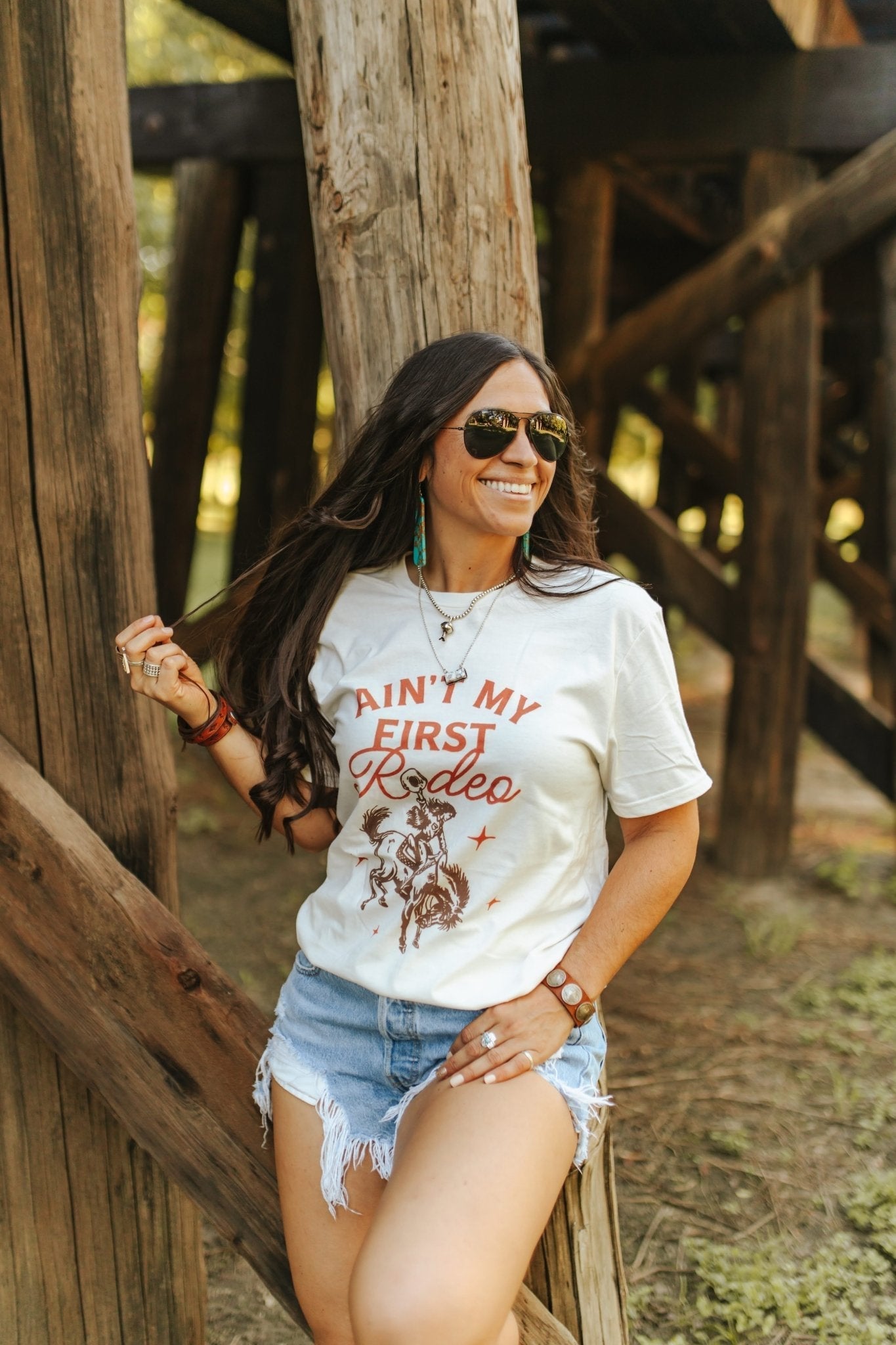 Ain't My First Rodeo Cowgirl Graphic Tee Shirt