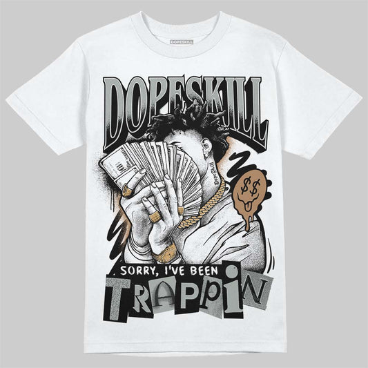 1906R ‚ÄòWhite Gold‚Äô DopeSkill T-Shirt Sorry I've Been Trappin Graphic